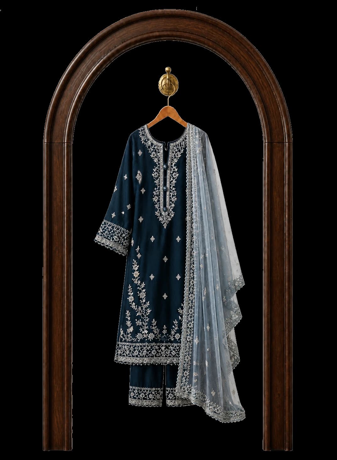 Asim Jofa embroidered Pakistani suit displayed in a dark walnut arch